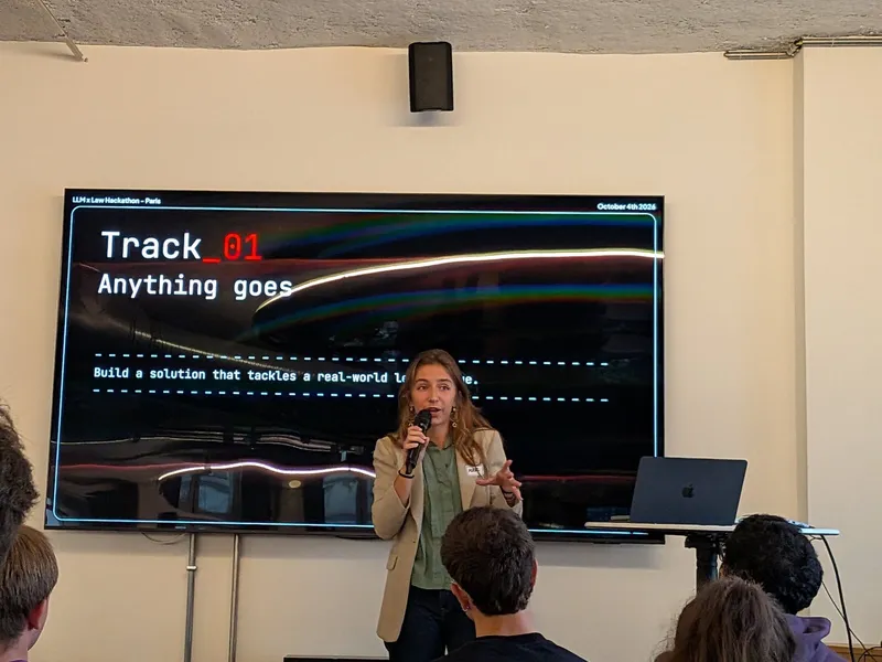 Organizer presenting Track 01: build a solution that tackles a real-world legal issue
